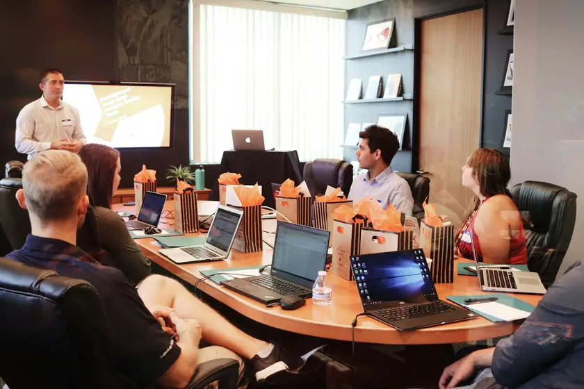 Business and technology stakeholders planning software delivery